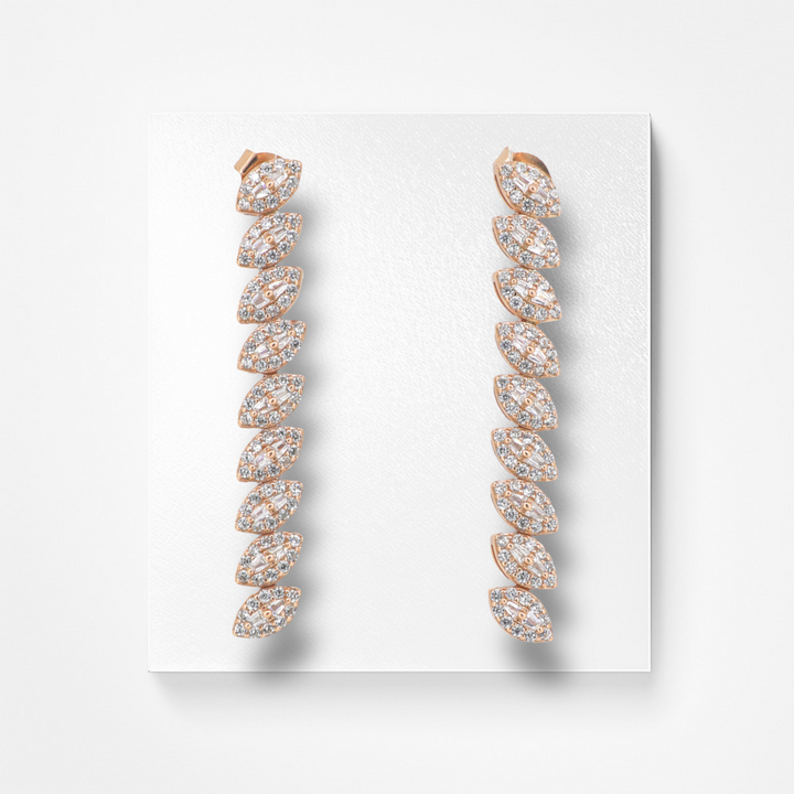 Hanging tear drop shaped silver earring set with rose gold finish