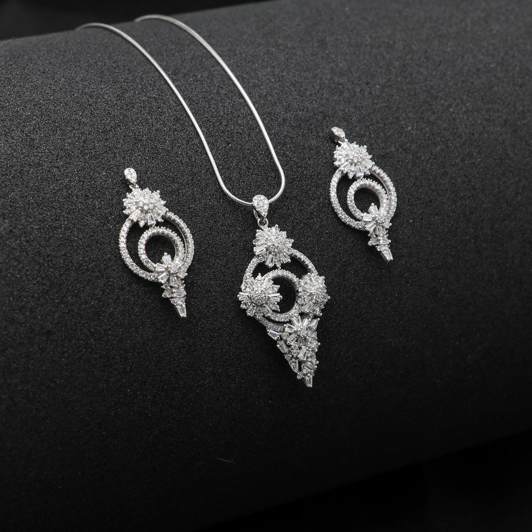 Shiny shanka shape pendant with matching earrings Silver Jewellery set