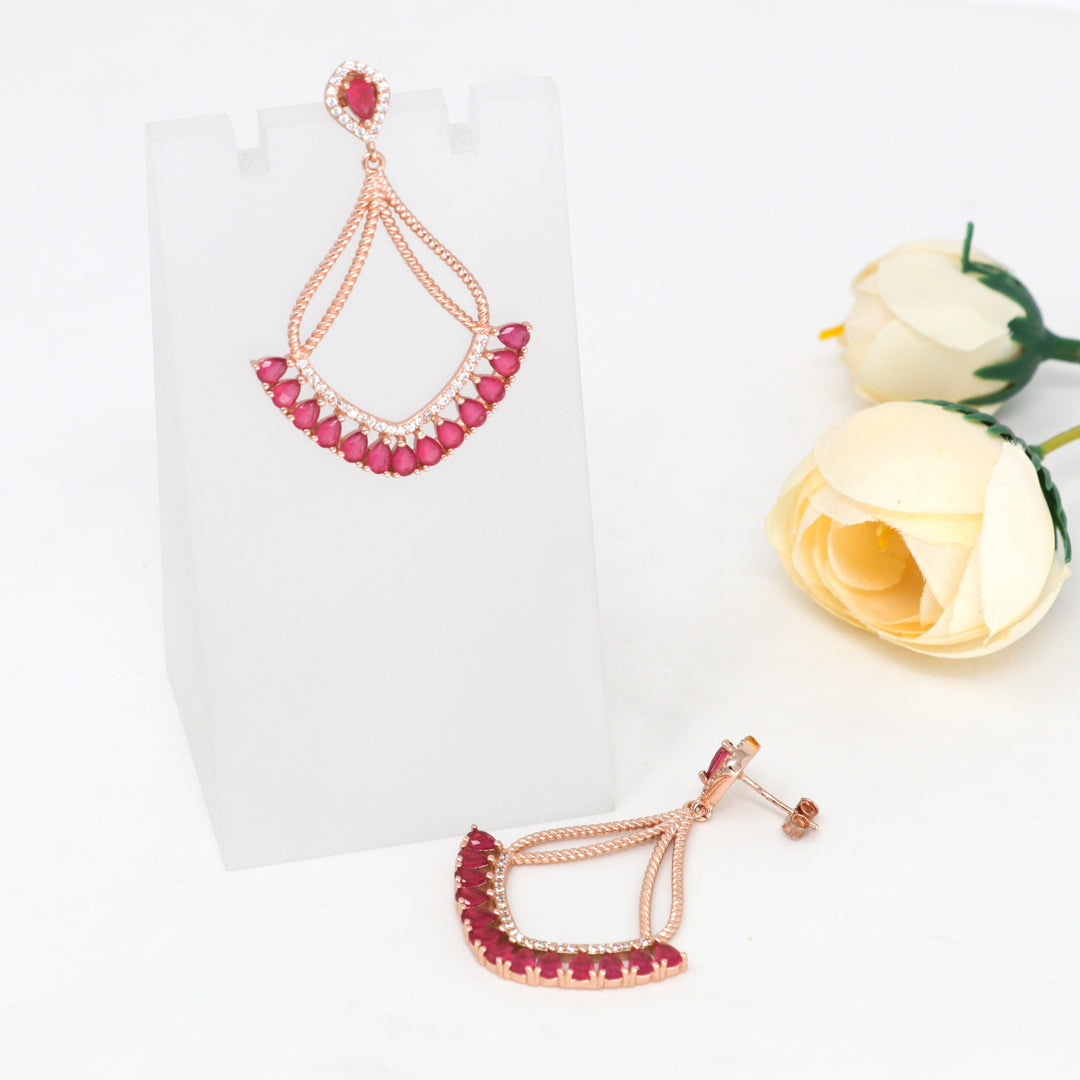 Elegant diamond shaped design rose gold coated dangler earring set