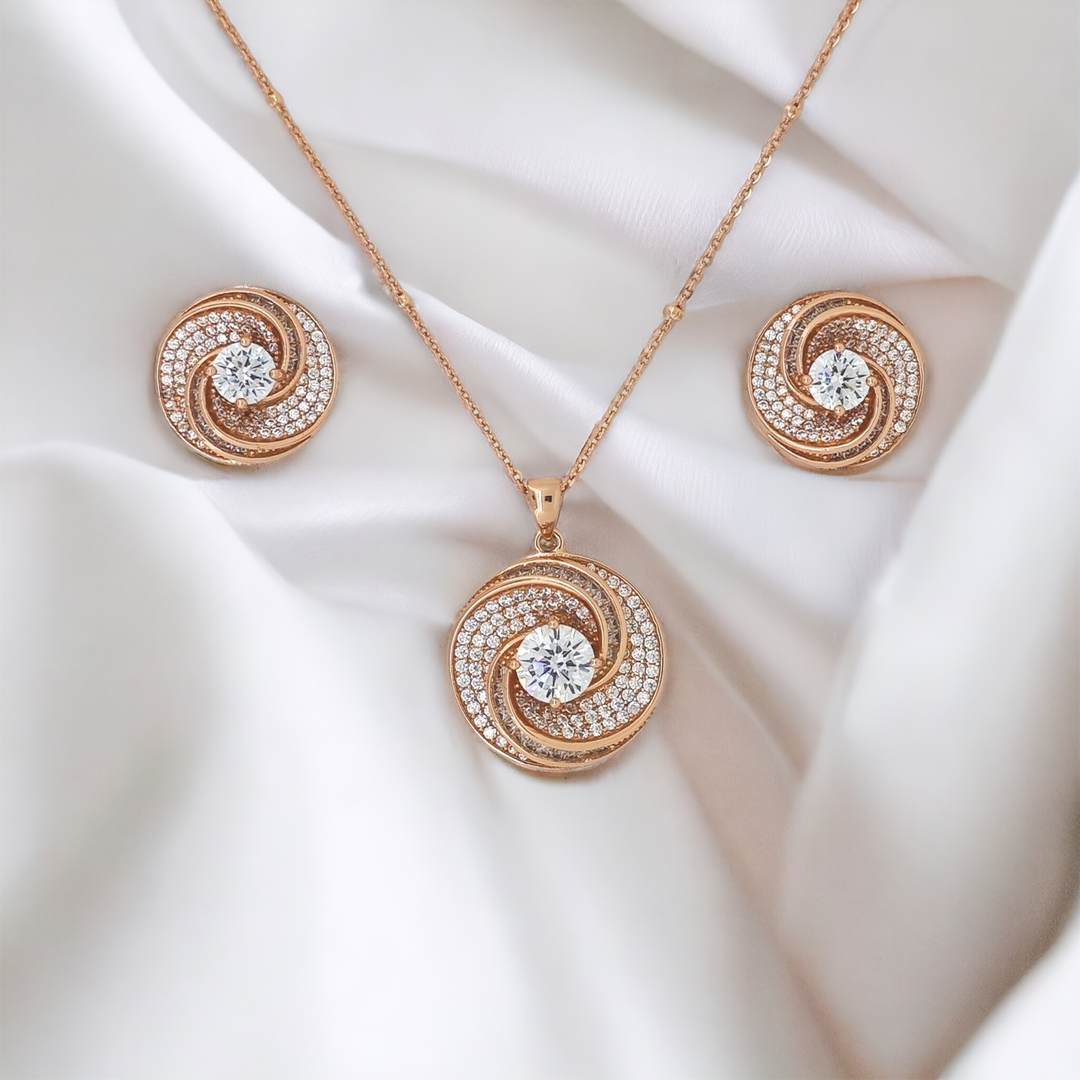 Designer Silver Pendant and matching earring set with Rose Gold plated.