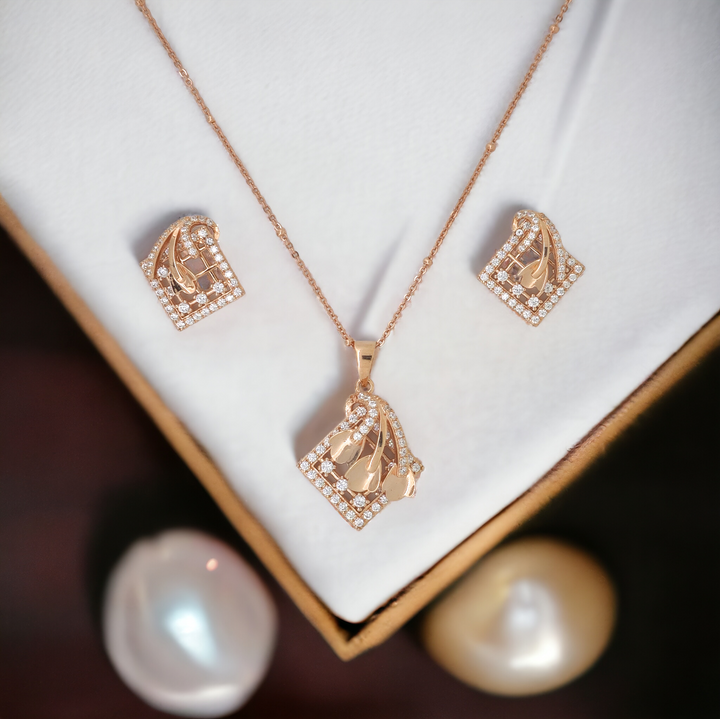 Designer Silver Pendant and matching earring set with Rose Gold plated.