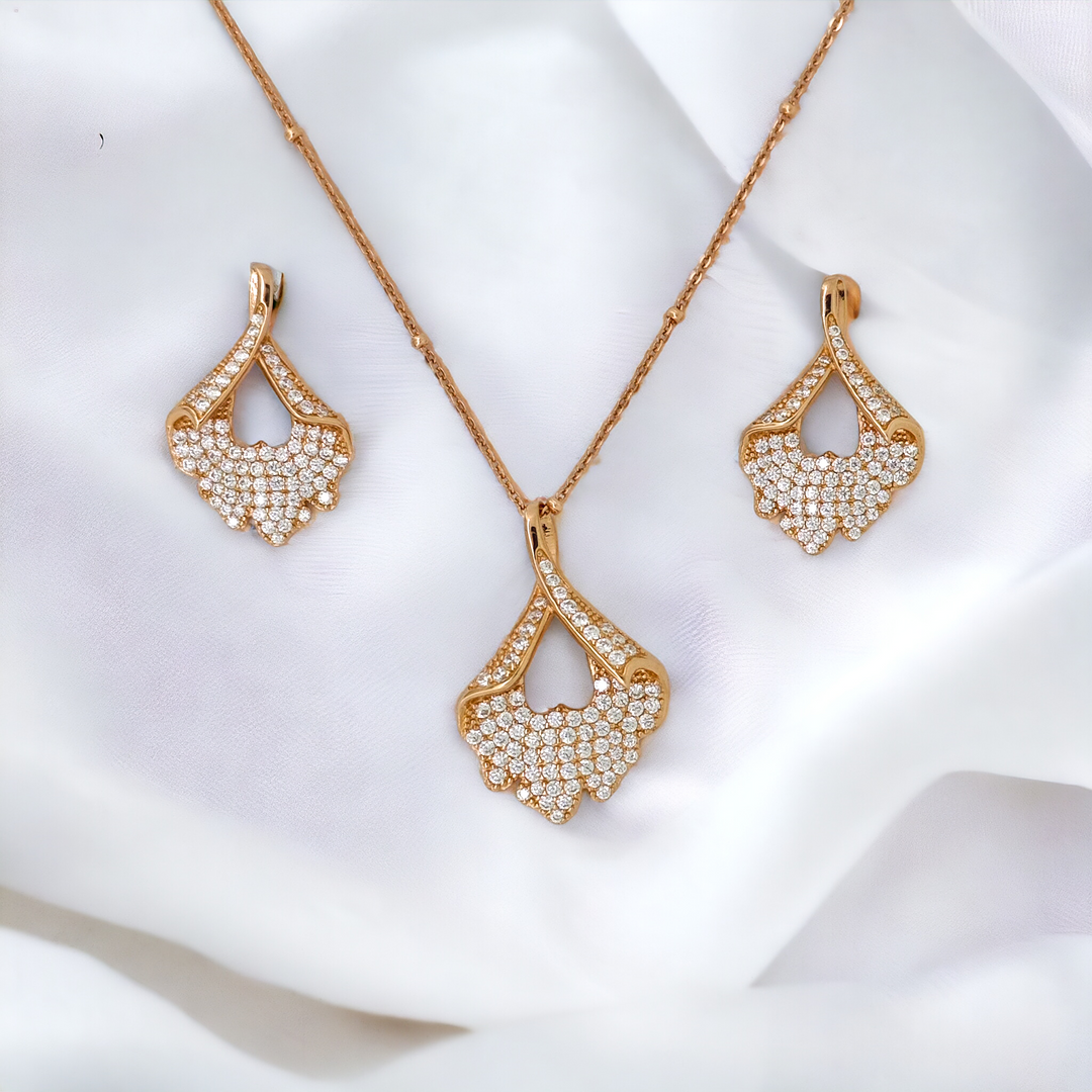 Designer Silver Pendant and matching earring set with Rose Gold plated.