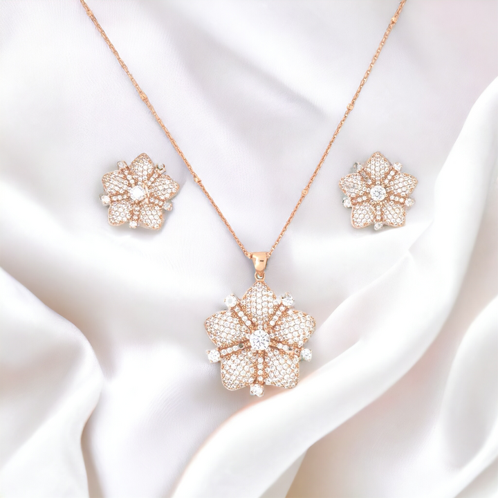 Designer Silver Pendant and matching earring set with Rose Gold plated.