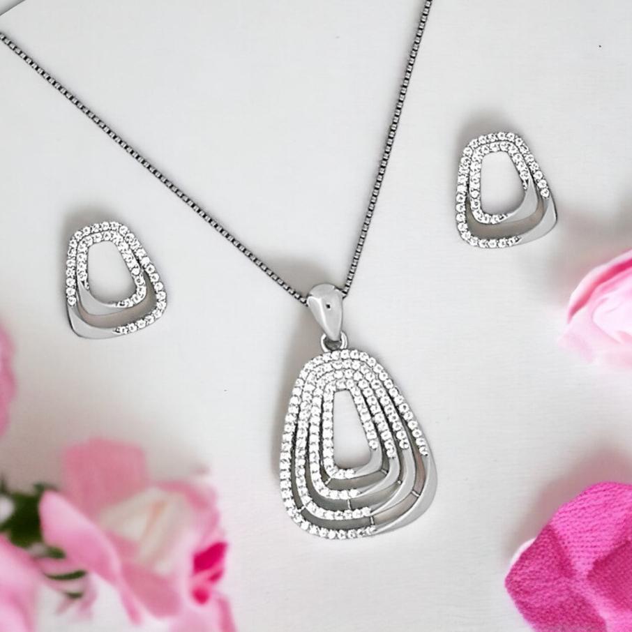 designer silver Pendant and matching earring set with matte finish