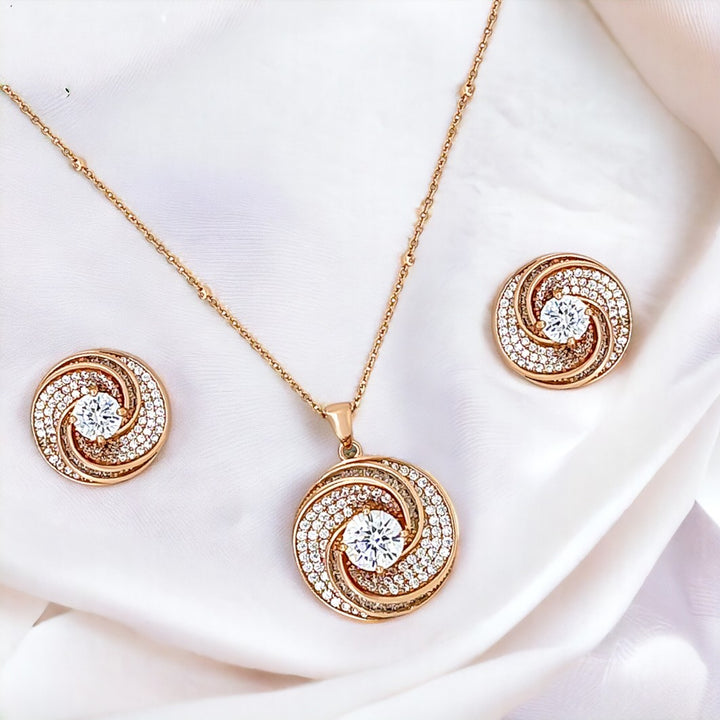 Designer Silver Pendant and matching earring set with Rose Gold plated.